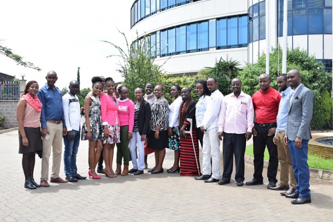  Multimedia University pose for a photo outside The Standard Group PLC. 