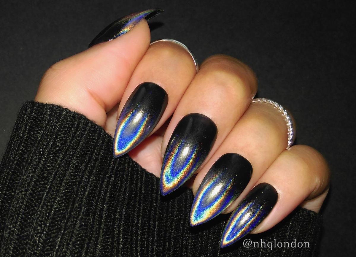 1. "Black and Silver Edgy Acrylic Nail Design" - wide 9