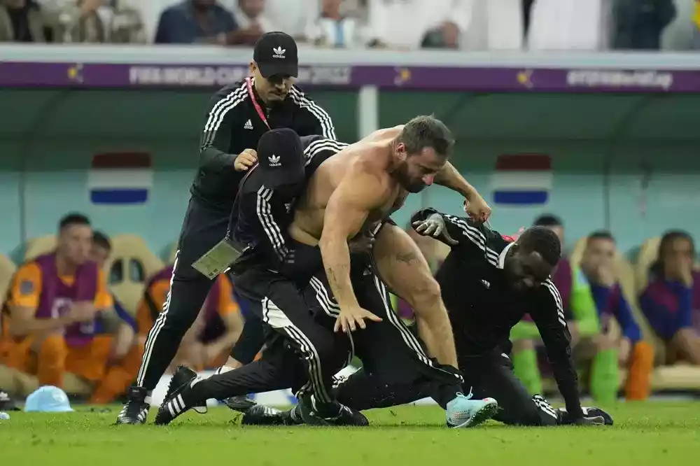 Fan runs on field during Argentina-Netherlands at World Cup