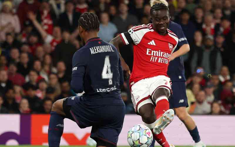 Arsenal cruise past Lille into share of Champions League lead