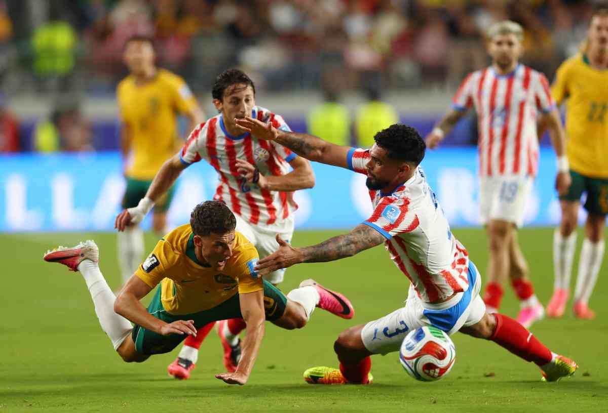 Australia draw with Paraguay to clinch World Cup last 32 place