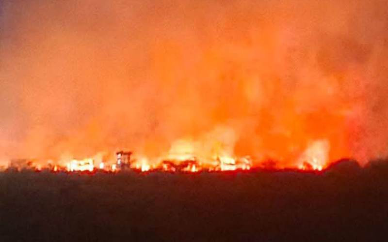 Part of JKIA grassland on fire