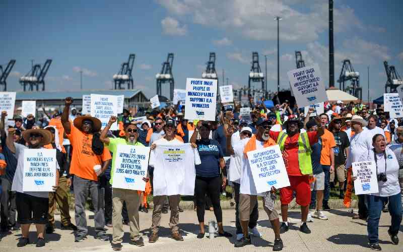 Cranes stand still as US dockworkers fight for 'future'