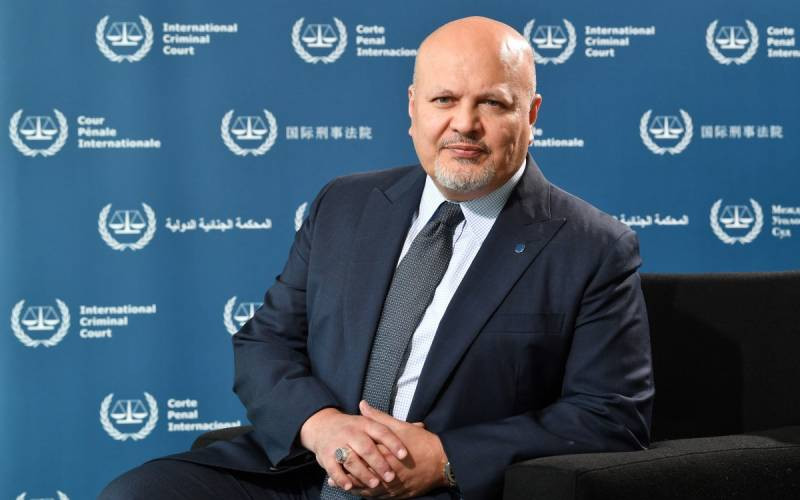 ICC prosecutor, under investigation, steps aside temporarily