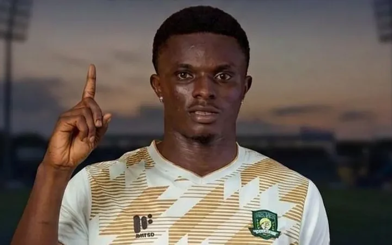 Footballer shot dead in armed robbery attack on team bus