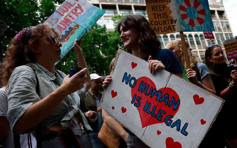 Anti-racism protesters rally a...