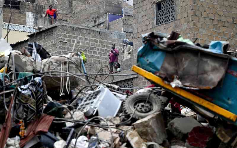 Pakistan building collapse site cleared with 27 dead