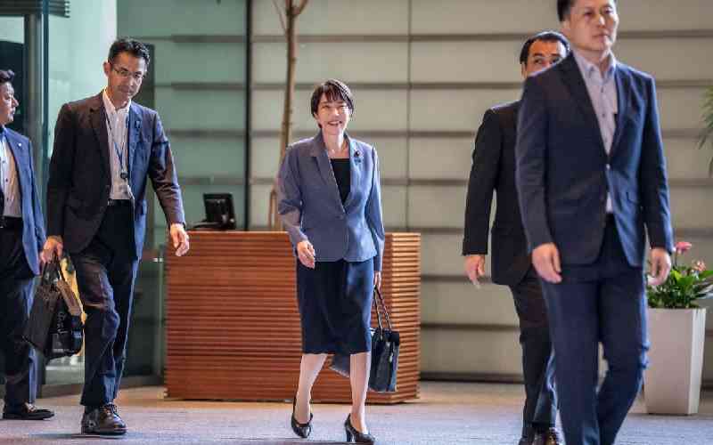 Japan to relax overtime regulation under workaholic PM