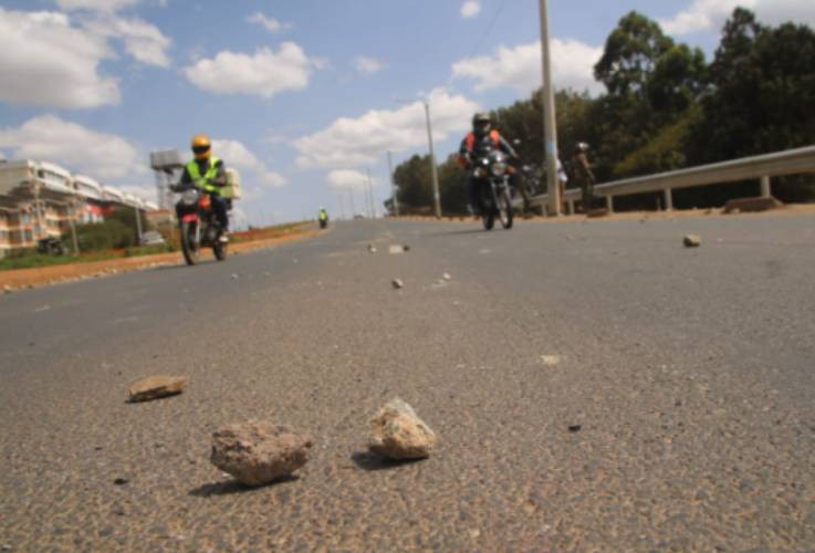 In photos: Police lob teargas to disperse unruly youths along Southern Bypass