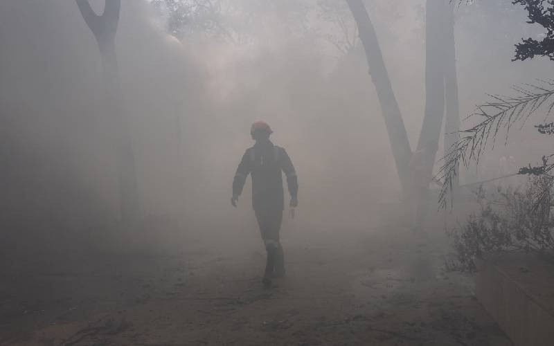 Flames and smoke in aftermath of Air India crash
