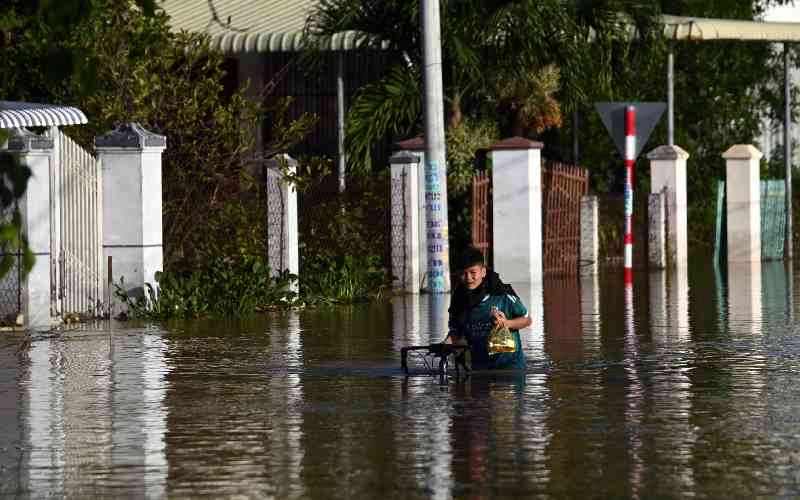 Flooding kills two as Vietnam hit by dozens of landslides