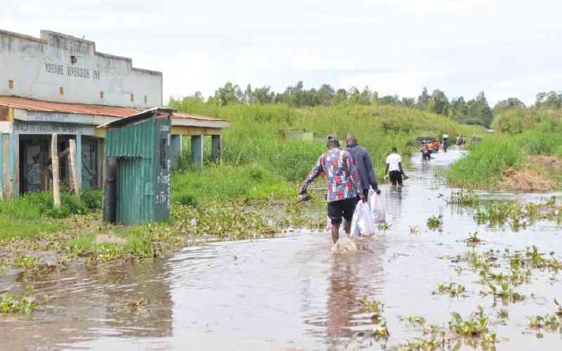 What should be done to end perennial flooding in Budalangi?
