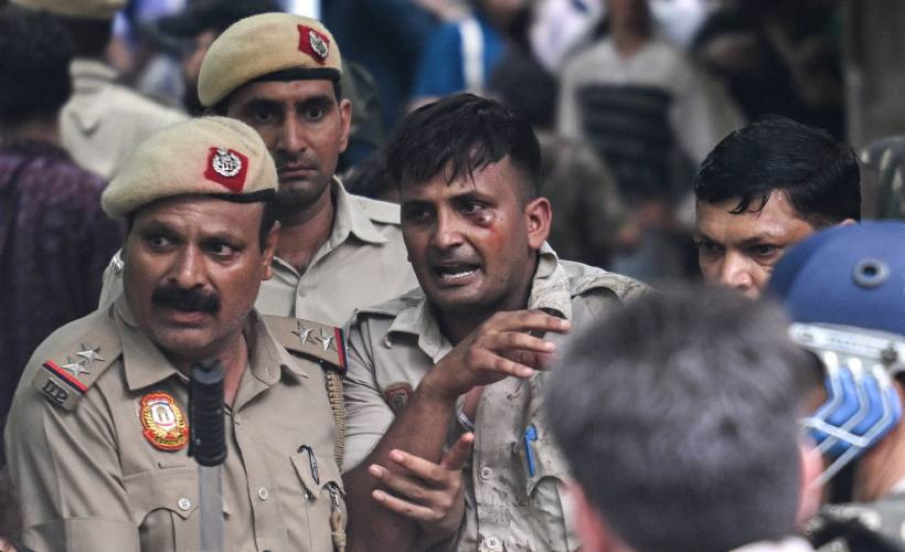 Indian police fire tear gas at exam protesters in capital