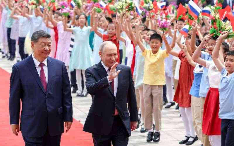 Putin, Xi hail 'unyielding' ties in talks after Trump visit
