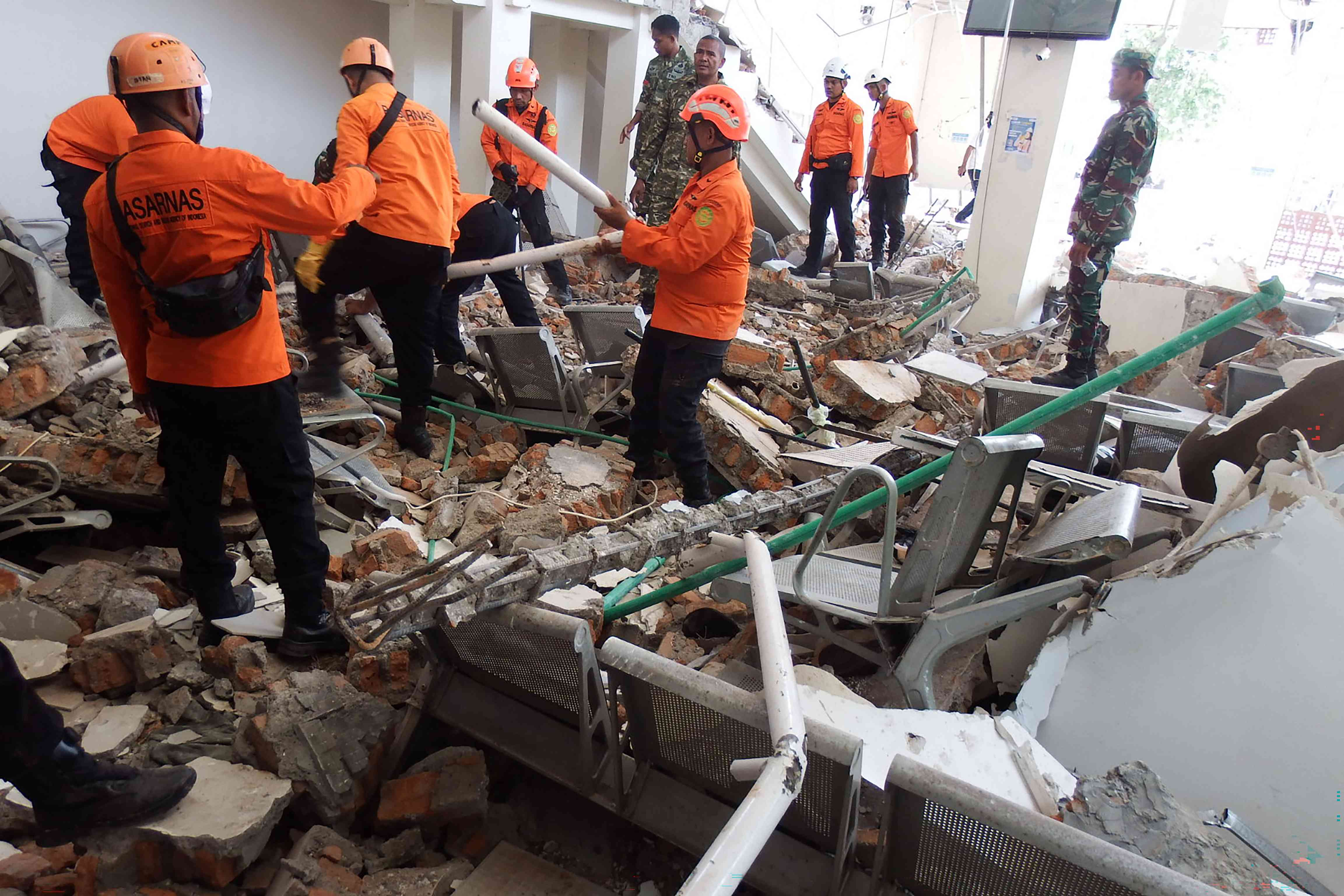 Indonesia rescuers search for survivors as quake death toll rises to 38