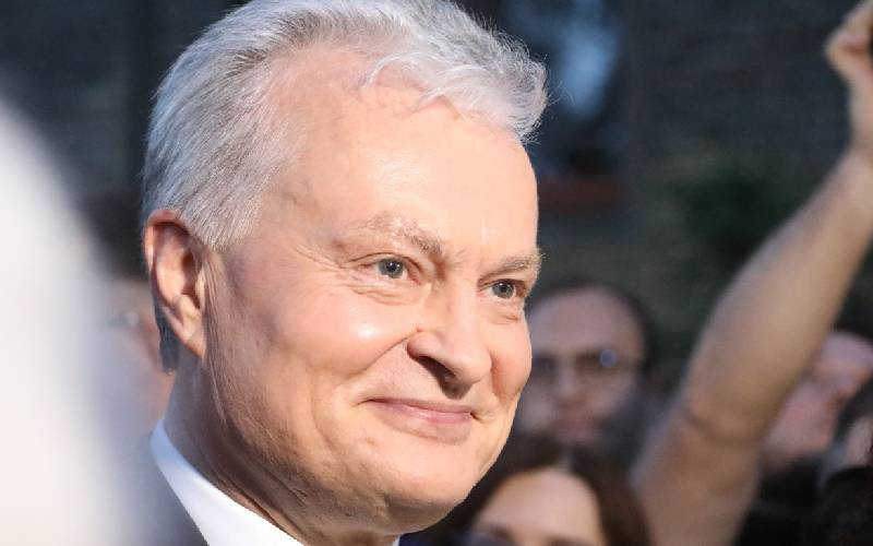 Lithuania's president: Former banker, Ukraine ally