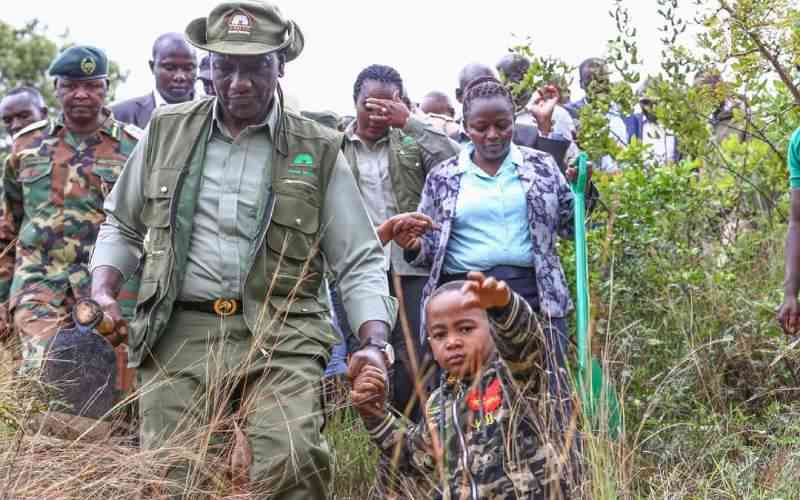 Five-year-old boy steals the show on tree planting day