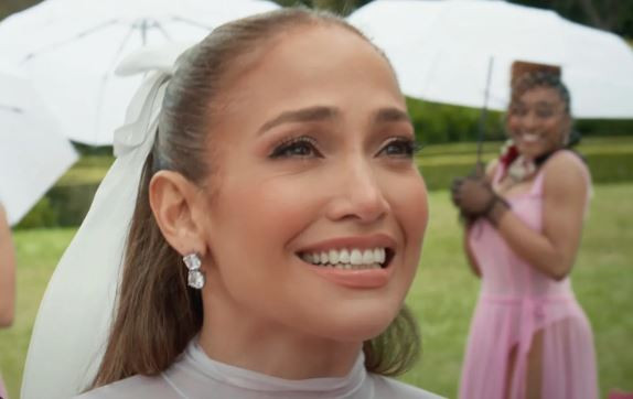Jennifer Lopez playfully mocks her wedding history in 'Can't Get Enough' music video