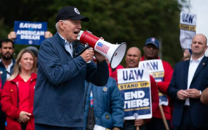 Biden, Trump woo union voters by visiting striking auto workers