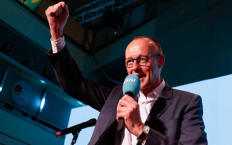 German vote winner Merz faces tough talks to build govt