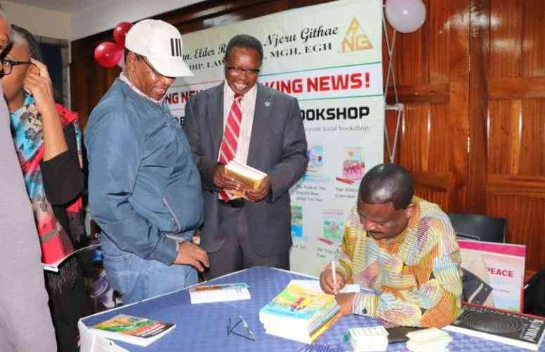 Former minister launches 15 fiction books