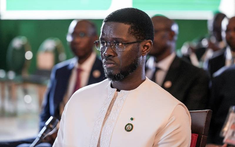 Senegal president names government, boycotted by rival