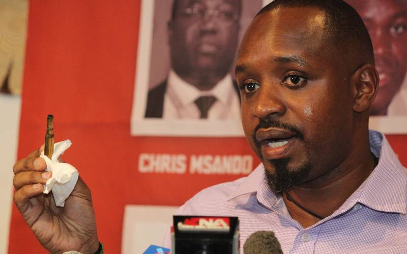 Activist Mwangi claims life in danger after bullet cartridge planted in his luggage