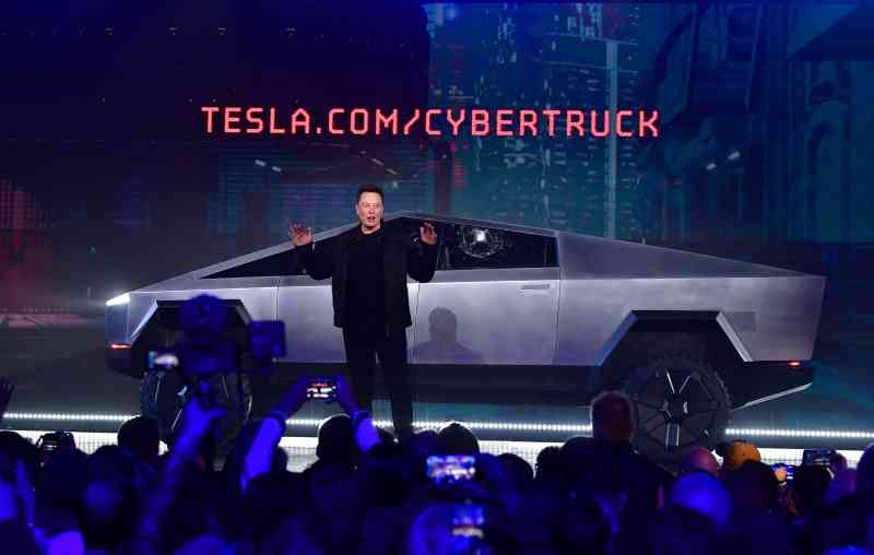 Elon Musk buys $1 billion in Tesla shares