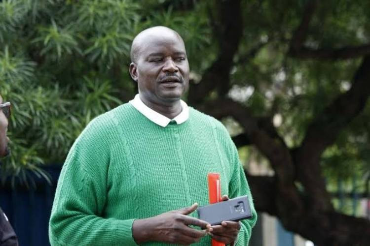 Kenya Basketball Federation Chairman Paul Agali Otula passes on