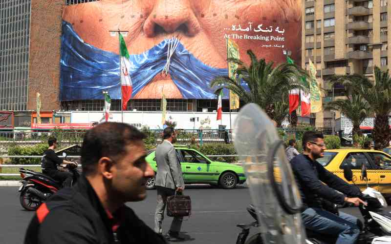 Iran warns of ceasefire violation as US plans to escort Hormuz ships