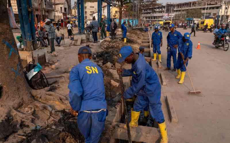 In DR Congo streets, ex-hoods get tough on litter -- and locals