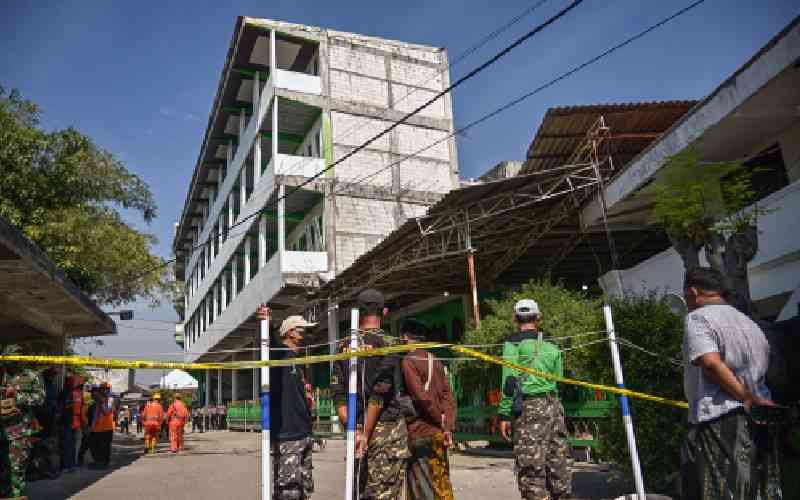 Rescuers say no more signs of life in rubble of collapsed Indonesian school