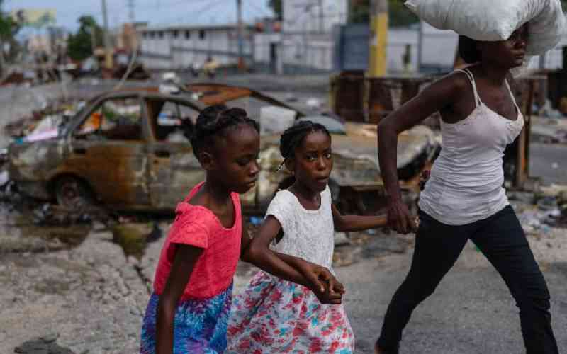 Haitians demand resignation, arrest of country's police chief after gang attack