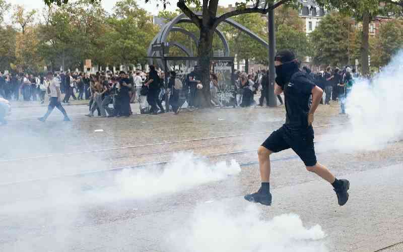 Smouldering bins, halted trams as French pupils protest