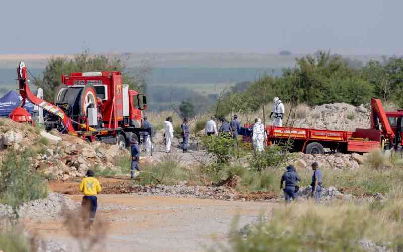 Dozens rescued, bodies pulled from S. Africa mining pit