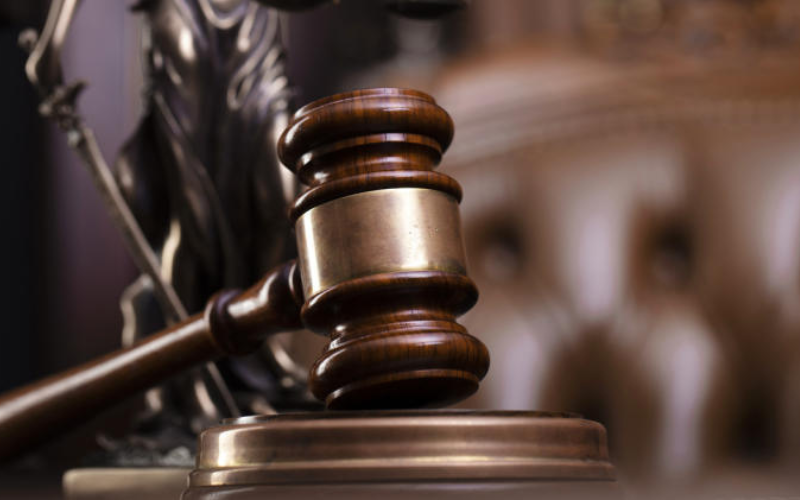 Woman accused of fatally stabbing her co-wife to remain in custody