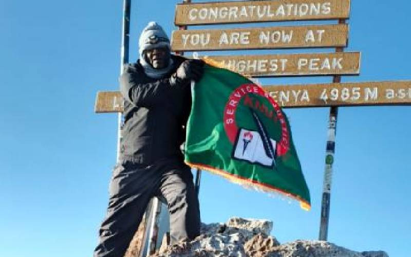 Knut hoists union's flag atop Mt Kenya's highest peak