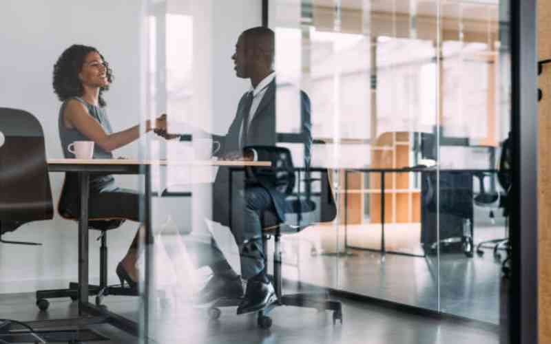 Private sector growth slows down but hiring holds