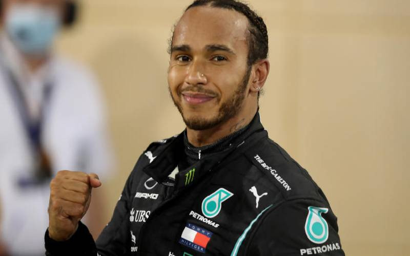 Lewis Hamilton 'tracing his Africa roots' at Mara