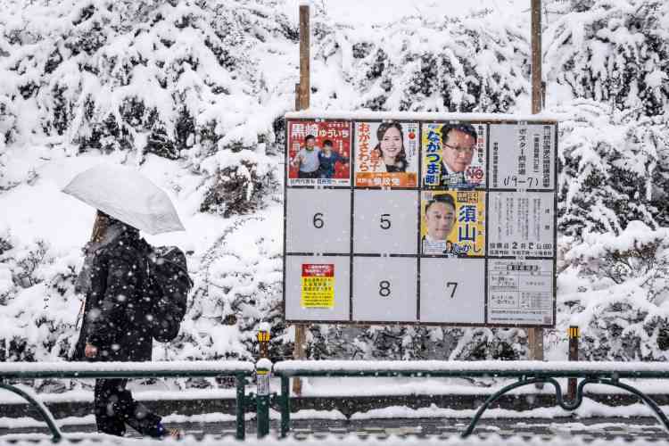 Japan votes in snow-hit snap polls as Takaichi eyes strong mandate