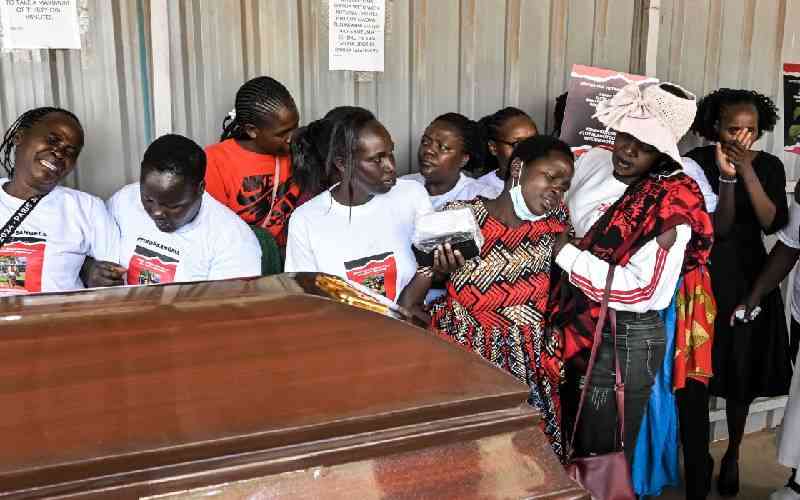 Uganda holds funeral for murde...