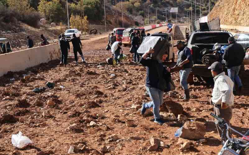 Between bomb craters: Taxis stuck on war-hit Lebanon-Syria border