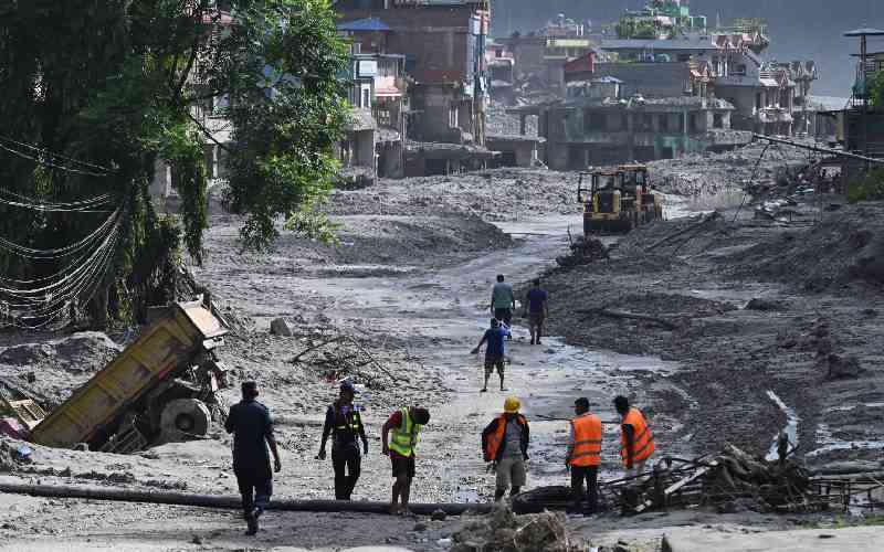 Rescuers dig into tunnel as missing toll from Nepal, China flood tops 3,000