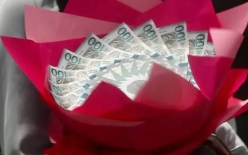 Ghana arrests seven women over money bouquets and money cakes