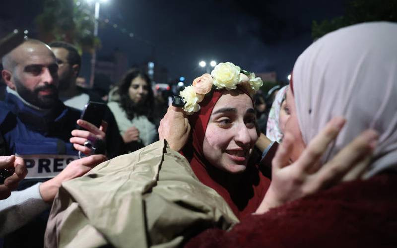 Late night tears, hugs as first lot of Palestinians set free by Israel