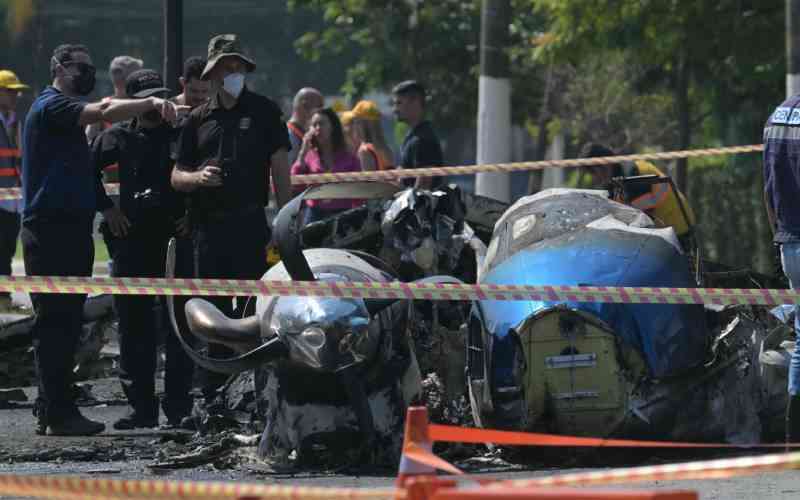 2 dead after small plane crashes in Sao Paulo street, hits bus