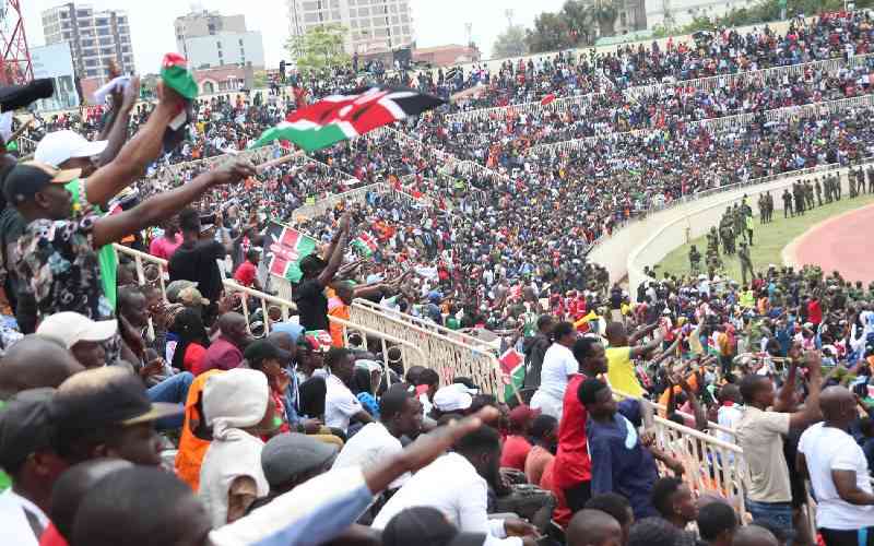 Nation bids bye to Jakom in a sea of flags and tears