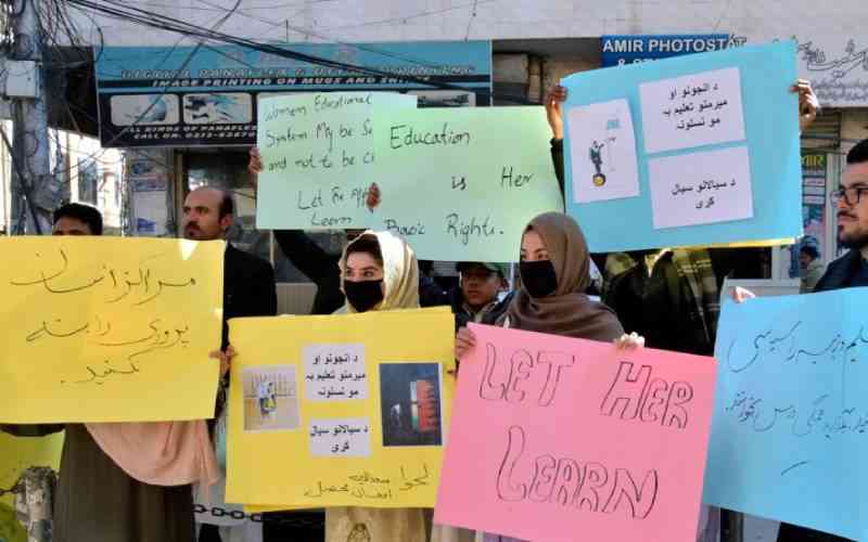 Taliban bans female NGO staff in Afghanistan, water cannon disperses women protesters