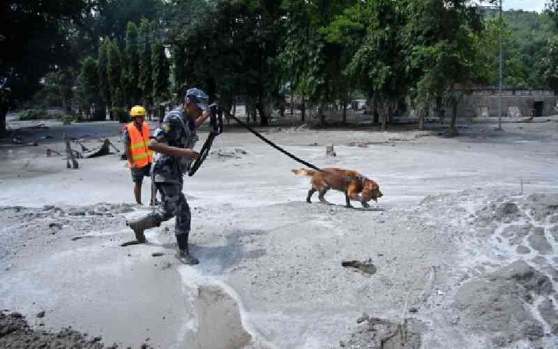 New flood risks impede Nepal, Tibet rescue