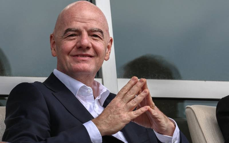 Embattled FIFA chief Infantino in emergency talks, suffers Figo blow
